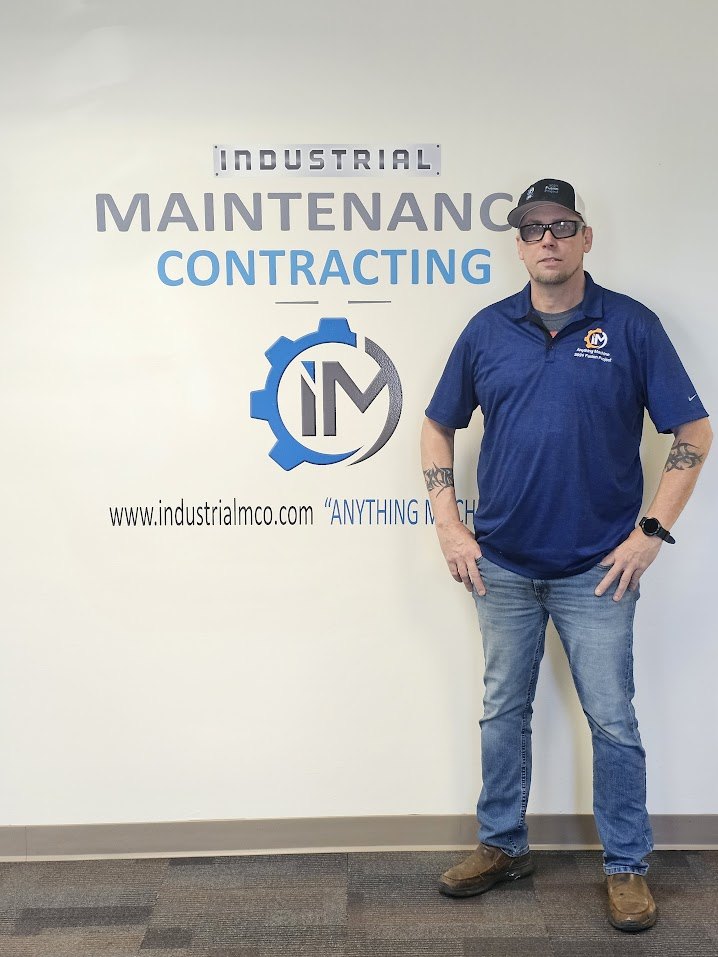 JR at Industrial Maintenance Contracting office wall